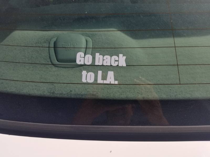 2004 Mercury Grand Marquis. Car rear window. Lettering from Gary C, CA